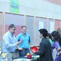 Students and Parents Engaging with Power Home Solar Solutions Representative